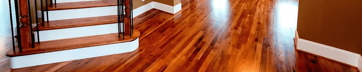 Base floor of a staircase with professionally restored wood flooring in Chattanooga TN