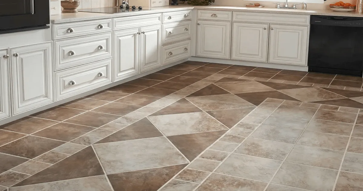 Kitchen with white cabinets and a professionally installed tile floor in Chattanooga, TN